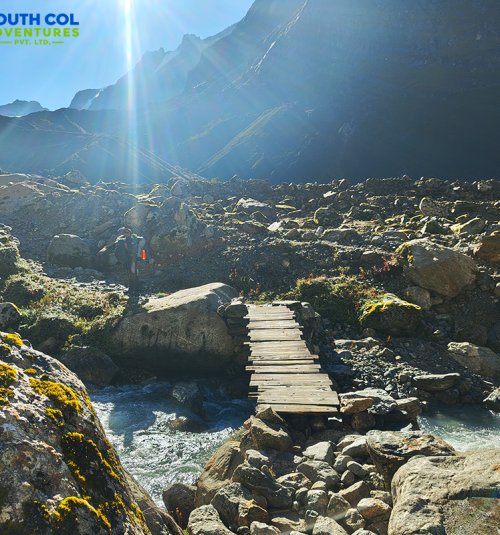 Crossing Wooden Bridge While Ascending Towards Thagnak To Khare